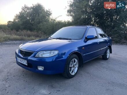 Синій Мазда 323, об'ємом двигуна 1.6 л та пробігом 250 тис. км за 2200 $, фото 1 на Automoto.ua