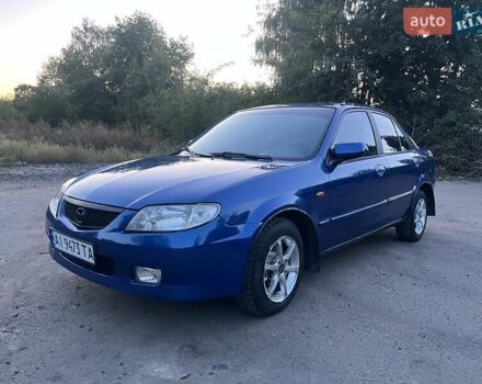 Синій Мазда 323, об'ємом двигуна 1.6 л та пробігом 250 тис. км за 2200 $, фото 1 на Automoto.ua
