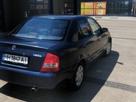 Синий Мазда 323, объемом двигателя 1.6 л и пробегом 300 тыс. км за 2000 $, фото 1 на Automoto.ua