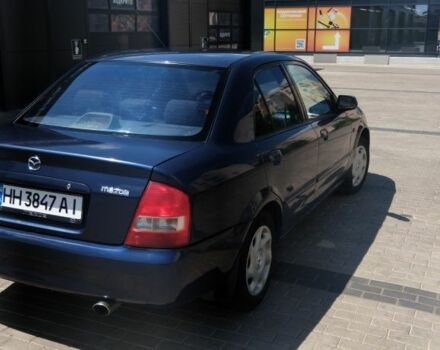 Синий Мазда 323, объемом двигателя 1.6 л и пробегом 300 тыс. км за 2000 $, фото 1 на Automoto.ua