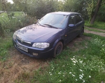 Синій Мазда 323, об'ємом двигуна 2 л та пробігом 236 тис. км за 1109 $, фото 1 на Automoto.ua