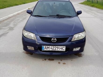 Синій Мазда 323, об'ємом двигуна 1.6 л та пробігом 300 тис. км за 1450 $, фото 1 на Automoto.ua