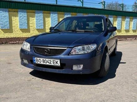 Синий Мазда 323, объемом двигателя 1.6 л и пробегом 320 тыс. км за 1450 $, фото 1 на Automoto.ua