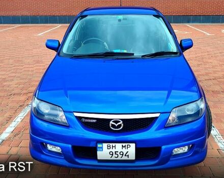 Синий Мазда 323, объемом двигателя 2 л и пробегом 183 тыс. км за 5300 $, фото 1 на Automoto.ua