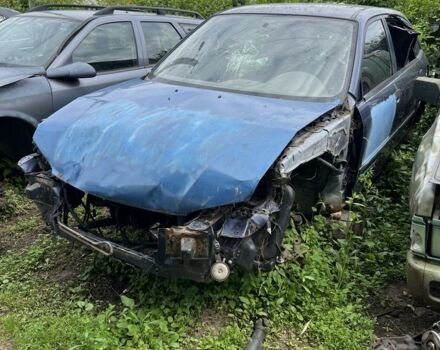 Синий Мазда 323, объемом двигателя 2 л и пробегом 200 тыс. км за 330 $, фото 1 на Automoto.ua