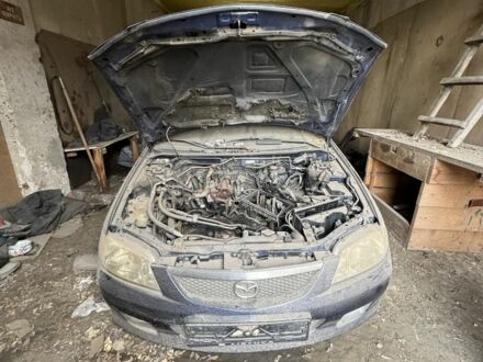 Синий Мазда 323, объемом двигателя 0 л и пробегом 200 тыс. км за 500 $, фото 1 на Automoto.ua