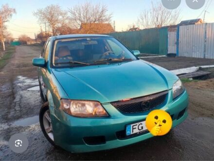 Синий Мазда 323, объемом двигателя 1.6 л и пробегом 1 тыс. км за 856 $, фото 1 на Automoto.ua