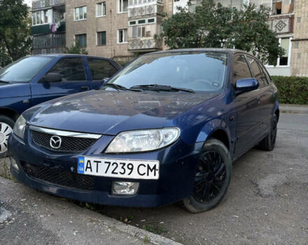 Синий Мазда 323, объемом двигателя 1.6 л и пробегом 250 тыс. км за 1600 $, фото 1 на Automoto.ua