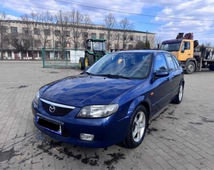 Синій Мазда 323, об'ємом двигуна 2 л та пробігом 259 тис. км за 1700 $, фото 1 на Automoto.ua