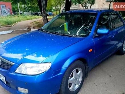 Синій Мазда 323, об'ємом двигуна 1.6 л та пробігом 240 тис. км за 2400 $, фото 1 на Automoto.ua