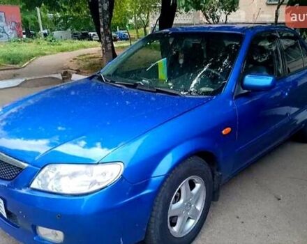 Синий Мазда 323, объемом двигателя 1.6 л и пробегом 240 тыс. км за 2400 $, фото 1 на Automoto.ua