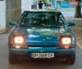 Зеленый Мазда 323, объемом двигателя 1.6 л и пробегом 290 тыс. км за 999 $, фото 1 на Automoto.ua