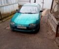 Зеленый Мазда 323, объемом двигателя 1.5 л и пробегом 300 тыс. км за 1650 $, фото 1 на Automoto.ua