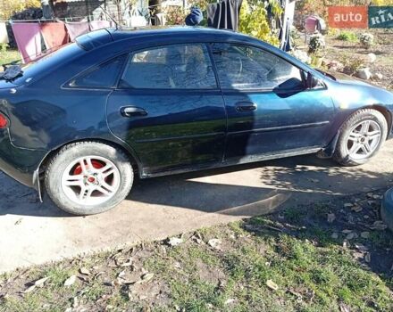 Зелений Мазда 323, об'ємом двигуна 1.49 л та пробігом 280 тис. км за 2500 $, фото 6 на Automoto.ua