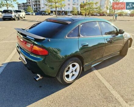 Зеленый Мазда 323, объемом двигателя 1.5 л и пробегом 433 тыс. км за 2700 $, фото 14 на Automoto.ua