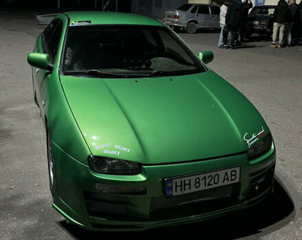 Зеленый Мазда 323, объемом двигателя 2 л и пробегом 200 тыс. км за 4200 $, фото 4 на Automoto.ua