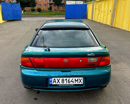 Зеленый Мазда 323, объемом двигателя 1.5 л и пробегом 250 тыс. км за 1350 $, фото 4 на Automoto.ua