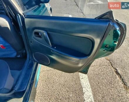 Зеленый Мазда 323, объемом двигателя 1.5 л и пробегом 433 тыс. км за 2700 $, фото 3 на Automoto.ua