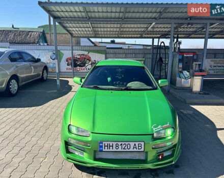 Зеленый Мазда 323, объемом двигателя 2 л и пробегом 200 тыс. км за 4200 $, фото 5 на Automoto.ua