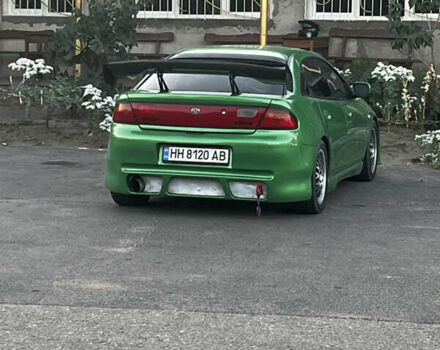 Зеленый Мазда 323, объемом двигателя 2 л и пробегом 200 тыс. км за 4200 $, фото 16 на Automoto.ua