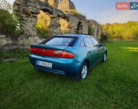 Зеленый Мазда 323, объемом двигателя 1.49 л и пробегом 359 тыс. км за 3199 $, фото 11 на Automoto.ua