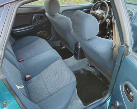 Зеленый Мазда 323, объемом двигателя 1.49 л и пробегом 359 тыс. км за 3199 $, фото 10 на Automoto.ua
