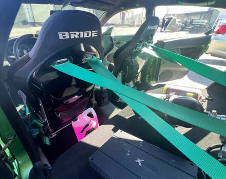 Зеленый Мазда 323, объемом двигателя 2 л и пробегом 200 тыс. км за 4200 $, фото 13 на Automoto.ua