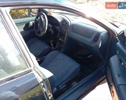 Зелений Мазда 323, об'ємом двигуна 1.49 л та пробігом 280 тис. км за 2500 $, фото 1 на Automoto.ua