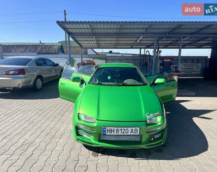 Зеленый Мазда 323, объемом двигателя 2 л и пробегом 200 тыс. км за 4200 $, фото 7 на Automoto.ua