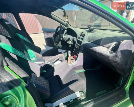 Зеленый Мазда 323, объемом двигателя 2 л и пробегом 200 тыс. км за 4200 $, фото 11 на Automoto.ua