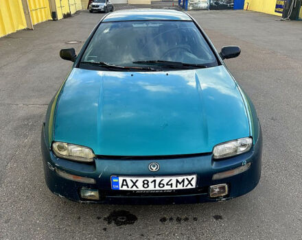 Зеленый Мазда 323, объемом двигателя 1.5 л и пробегом 250 тыс. км за 1350 $, фото 1 на Automoto.ua