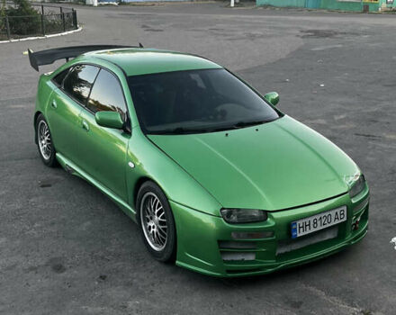 Зеленый Мазда 323, объемом двигателя 2 л и пробегом 200 тыс. км за 4200 $, фото 18 на Automoto.ua