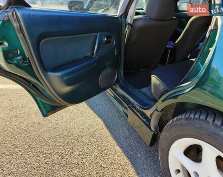 Зеленый Мазда 323, объемом двигателя 1.5 л и пробегом 433 тыс. км за 2700 $, фото 15 на Automoto.ua