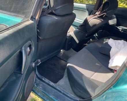 Зелений Мазда 323, об'ємом двигуна 1.5 л та пробігом 370 тис. км за 1900 $, фото 3 на Automoto.ua