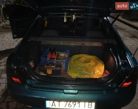 Зеленый Мазда 323, объемом двигателя 1.5 л и пробегом 350 тыс. км за 2750 $, фото 3 на Automoto.ua