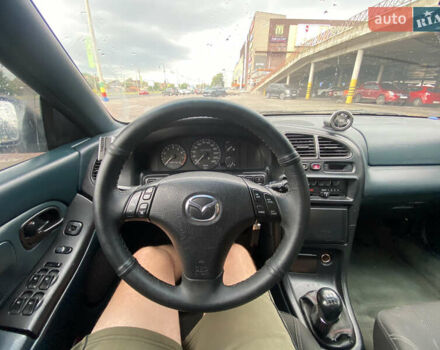 Зеленый Мазда 323, объемом двигателя 1.5 л и пробегом 426 тыс. км за 2300 $, фото 4 на Automoto.ua