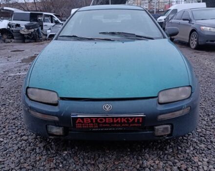 Зеленый Мазда 323, объемом двигателя 1.5 л и пробегом 300 тыс. км за 699 $, фото 3 на Automoto.ua