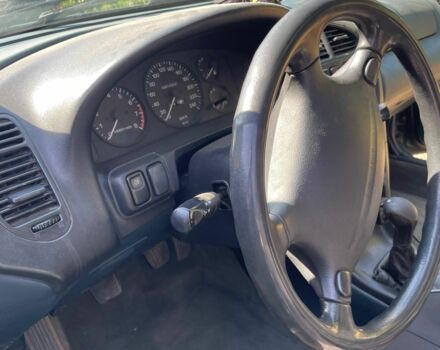 Зелений Мазда 323, об'ємом двигуна 1.5 л та пробігом 370 тис. км за 1900 $, фото 2 на Automoto.ua