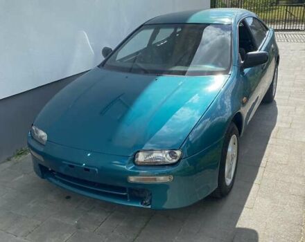 Зеленый Мазда 323, объемом двигателя 1.49 л и пробегом 322 тыс. км за 2600 $, фото 1 на Automoto.ua