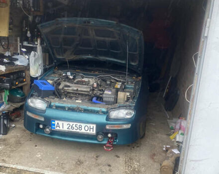 Зеленый Мазда 323, объемом двигателя 1.5 л и пробегом 426 тыс. км за 2300 $, фото 6 на Automoto.ua