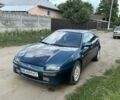 Зеленый Мазда 323, объемом двигателя 2 л и пробегом 300 тыс. км за 2200 $, фото 1 на Automoto.ua