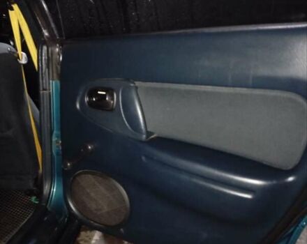 Зеленый Мазда 323, объемом двигателя 1.5 л и пробегом 350 тыс. км за 2750 $, фото 12 на Automoto.ua