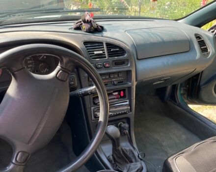 Зелений Мазда 323, об'ємом двигуна 1.5 л та пробігом 370 тис. км за 1900 $, фото 1 на Automoto.ua