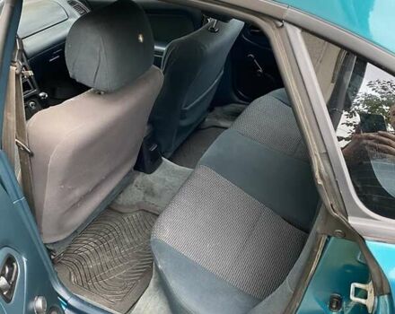 Зеленый Мазда 323, объемом двигателя 1.49 л и пробегом 322 тыс. км за 2600 $, фото 9 на Automoto.ua