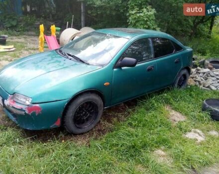 Зеленый Мазда 323, объемом двигателя 1.8 л и пробегом 320 тыс. км за 1700 $, фото 8 на Automoto.ua