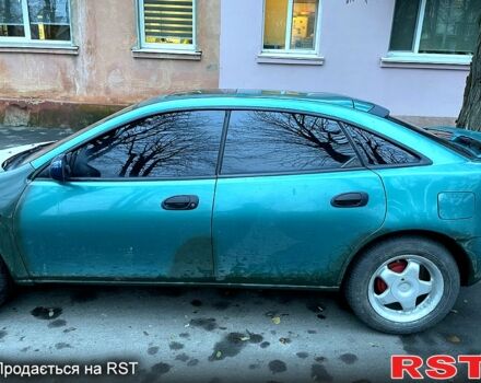 Зеленый Мазда 323, объемом двигателя 1.5 л и пробегом 334 тыс. км за 1800 $, фото 2 на Automoto.ua