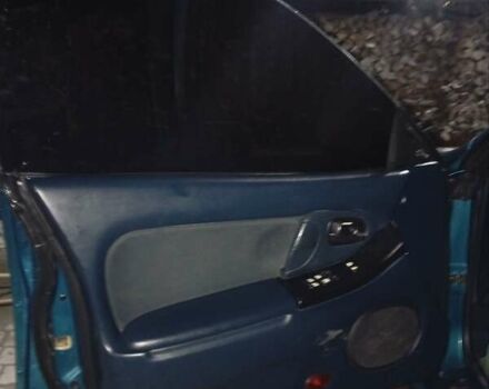 Зеленый Мазда 323, объемом двигателя 1.5 л и пробегом 350 тыс. км за 2750 $, фото 6 на Automoto.ua