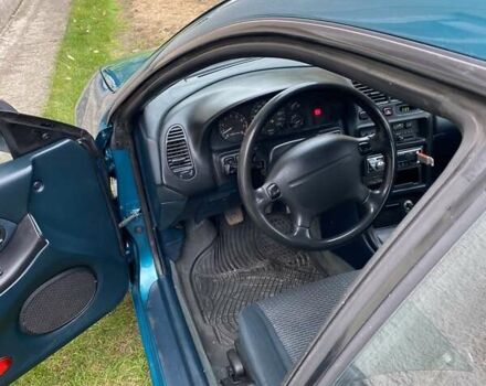 Зеленый Мазда 323, объемом двигателя 1.49 л и пробегом 322 тыс. км за 2600 $, фото 6 на Automoto.ua