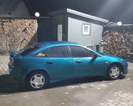 Зеленый Мазда 323, объемом двигателя 1.5 л и пробегом 350 тыс. км за 2750 $, фото 15 на Automoto.ua