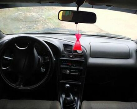 Зеленый Мазда 323, объемом двигателя 10 л и пробегом 100 тыс. км за 960 $, фото 4 на Automoto.ua